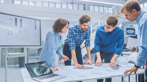 Team working on complete systems engineering