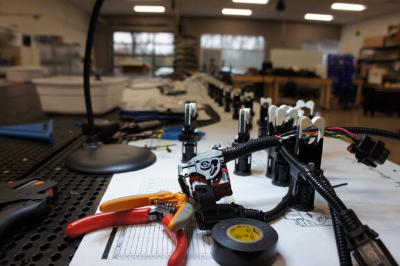 Custom wire harness assembly and prototype testing setup for contract engineering services.